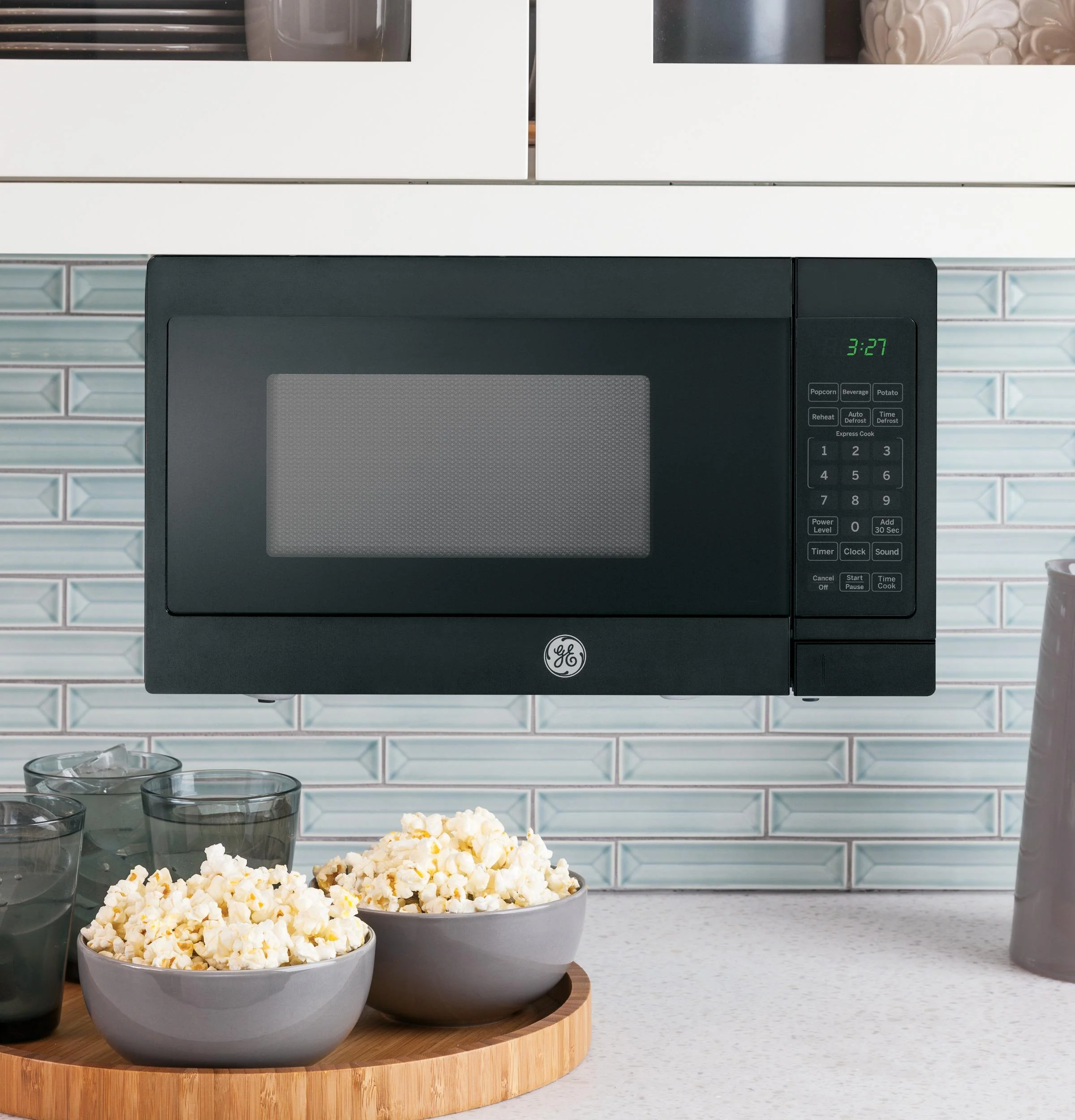 GE® 0.7 Cu. Ft. Spacemaker® Countertop Microwave Oven - Image 4