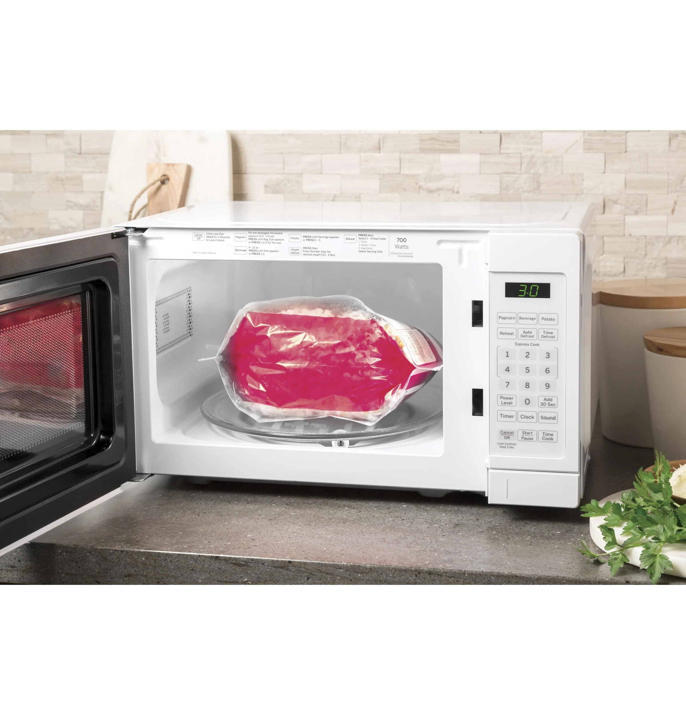 GE® 0.7 Cu. Ft. Capacity Countertop Microwave Oven - Image 4