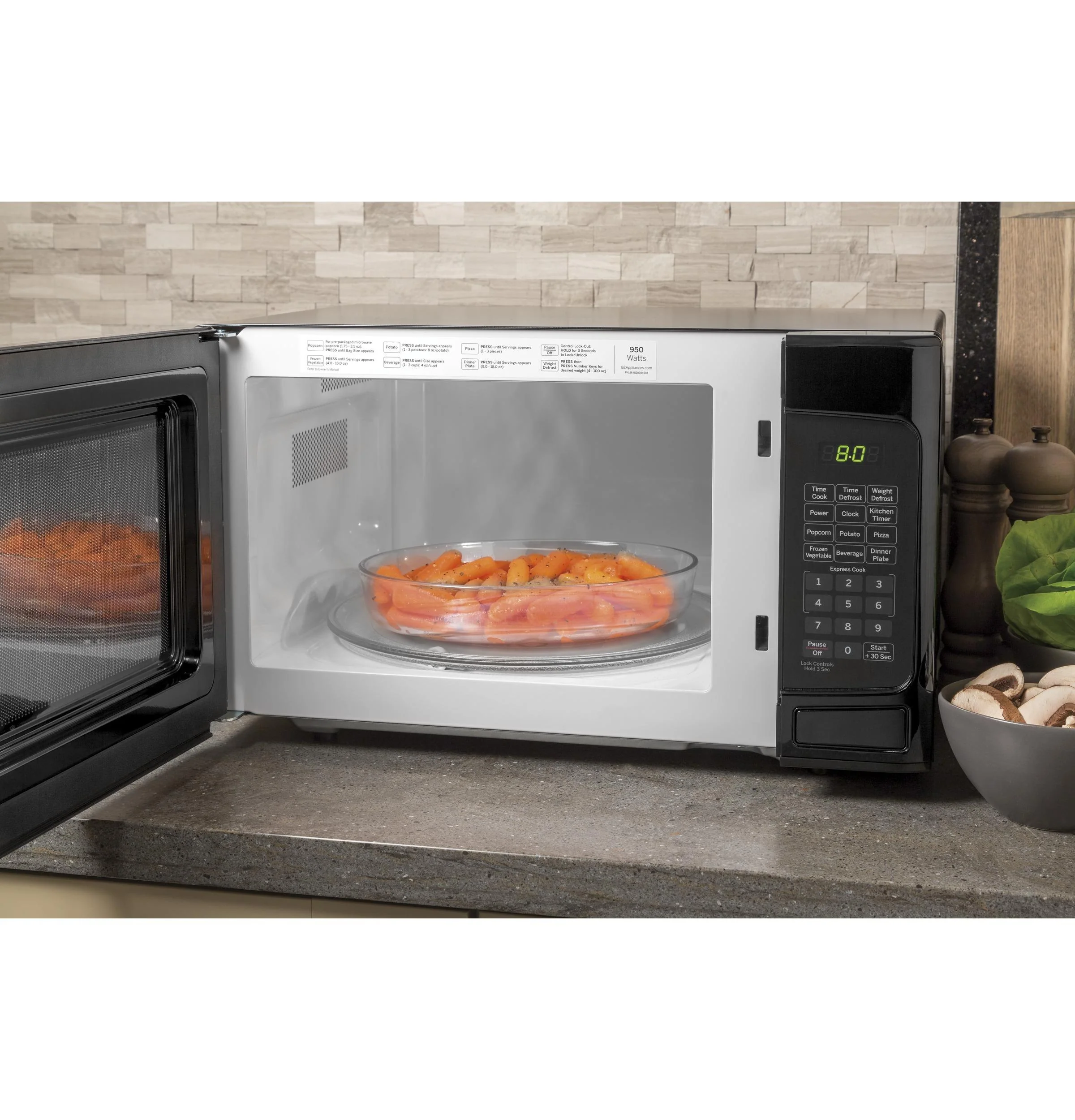 GE® 1.1 Cu. Ft. Capacity Countertop Microwave Oven - Image 4