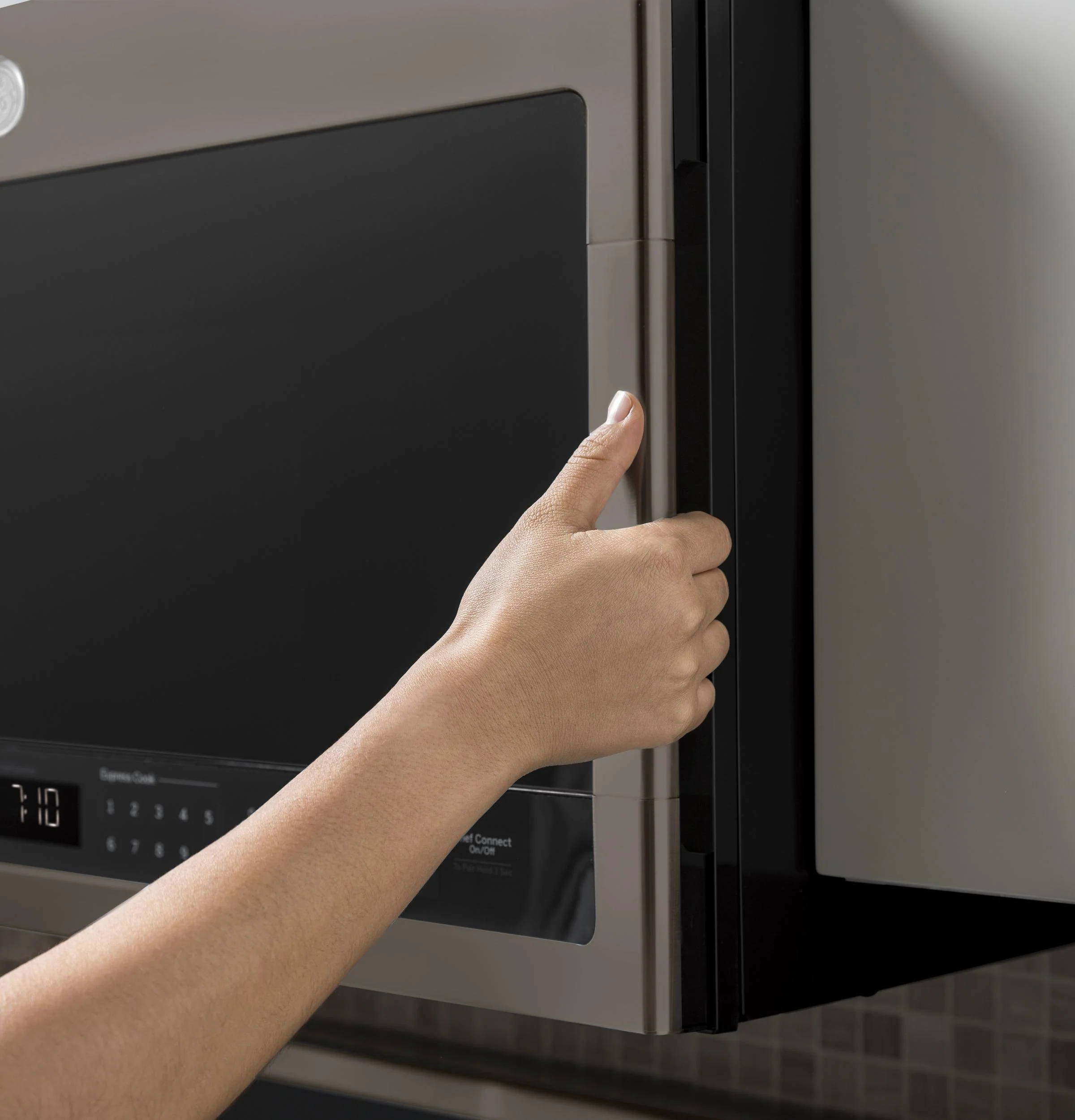 GE Profile™ 2.1 Cu. Ft. Over-the-Range Sensor Microwave Oven - Image 4